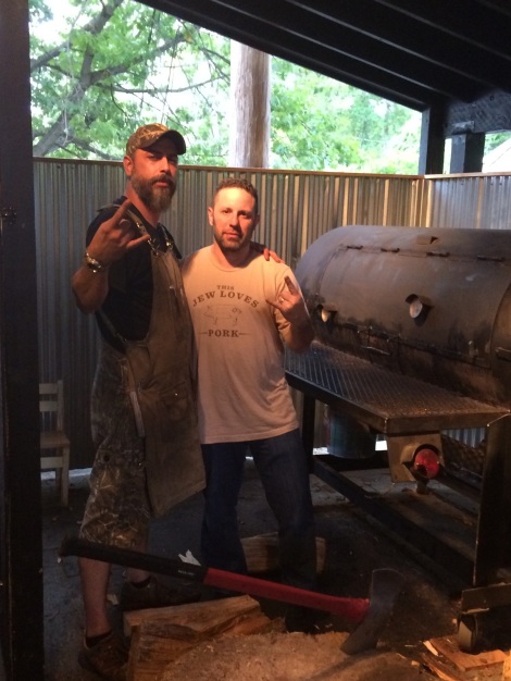 Michael Strauss (r) with Nestor Laracuente in September at Hoodoo Brown BBQ where Laracuente was pit master.